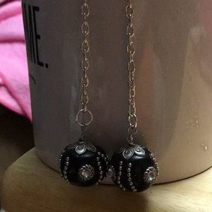 Large black and silver bead on silver metal chain .. fish hook earrings